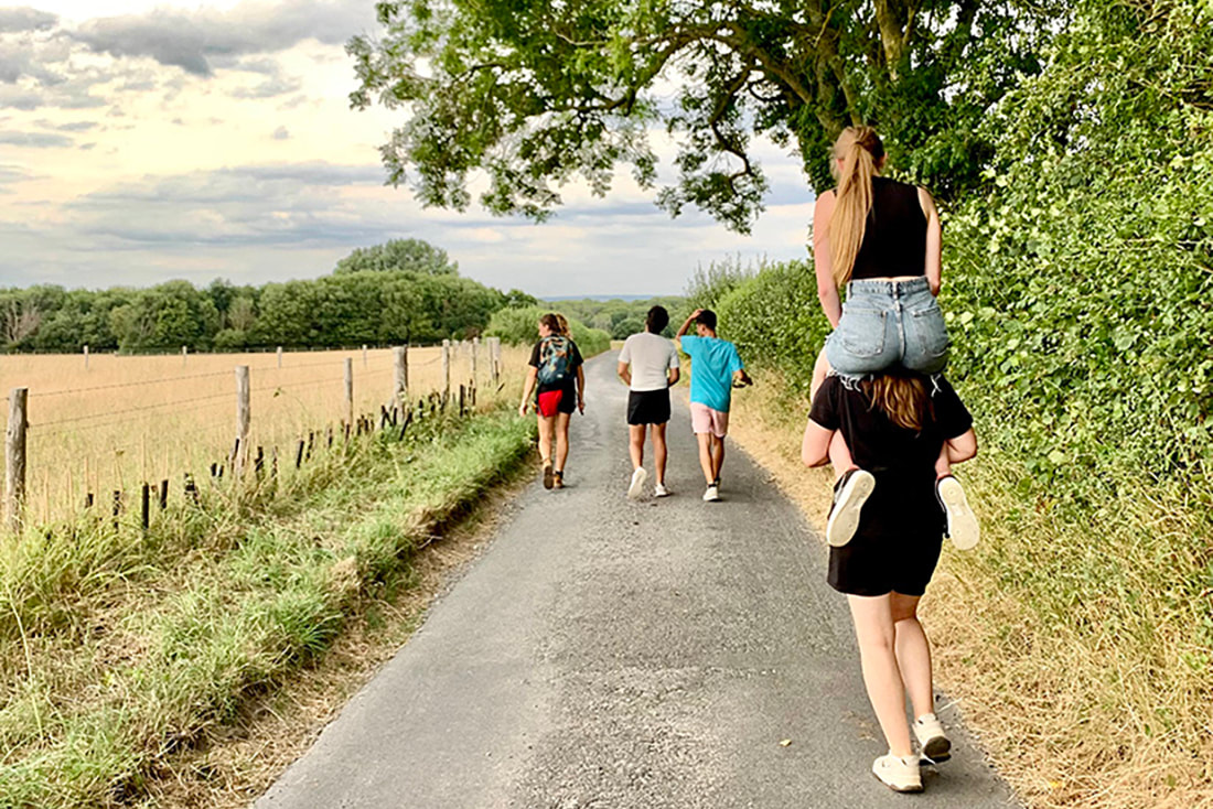 Image of 5 young people walking along a country lane © Big Leaf Foundation
